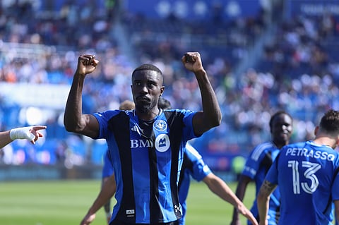 Prince Owusu celebrates after scoring