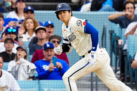 Shohei Ohtani runs after hitting a single