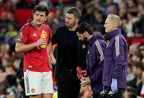 Harry Maguire with Michael Carrick 