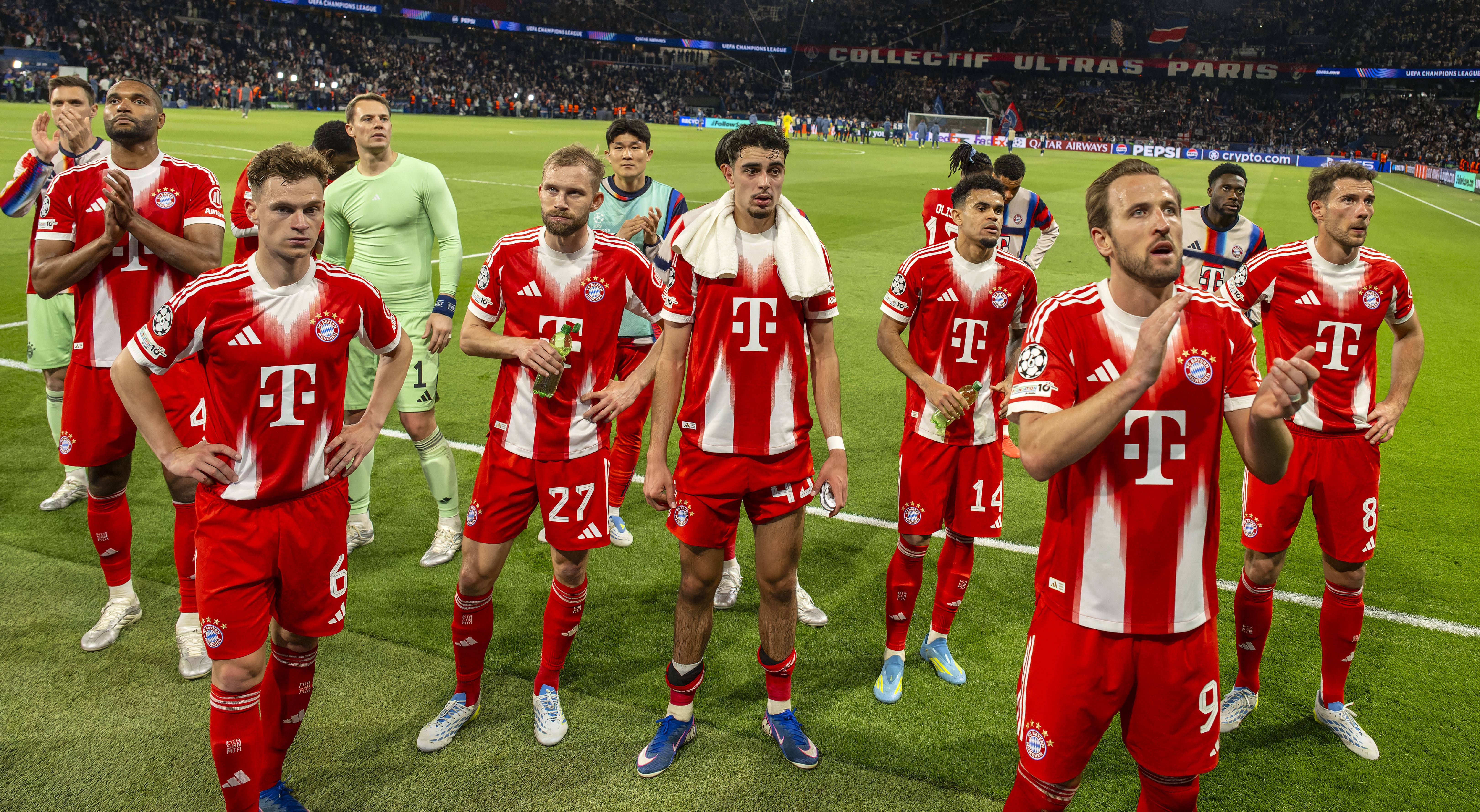 Bayern Munich players applaud the away fans at full-time