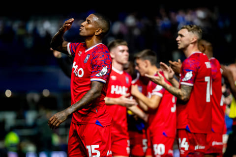 Ashley Young acknowledges the fans at full-time