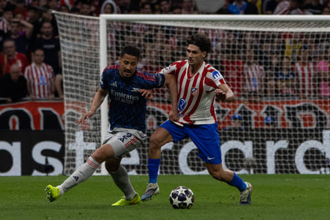 Julian Alvarez and William Saliba in action