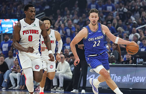 Detroit Pistons and Orlando Magic players in action