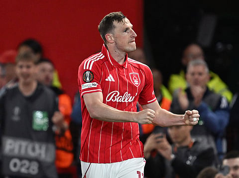 Chris Wood celebrates after scoring from the spot
