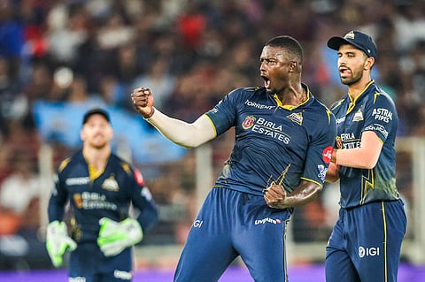 Jason Holder celebrates after dismissing Jitesh Sharma of RCB