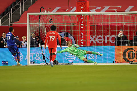 Evander scores from the penalty spot