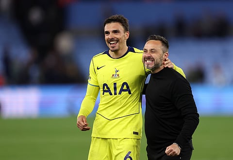 Roberto De Zerbi with Joao Palhinha after full-time