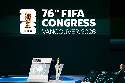 FIFA World Cup logo being displayed at the 76th FIFA Congress meeting in Vancouver