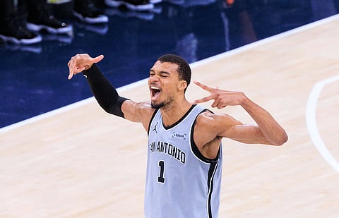 Victor Wembanyama celebrates after scoring a three-pointer