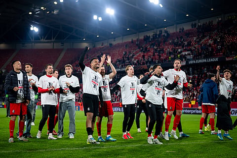 Freiburg players celebrate after advancing to UEFA Europa League final