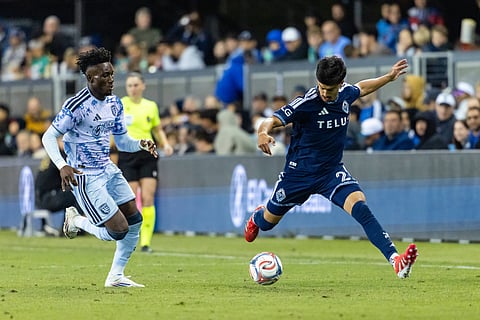 Vancouver Whitecaps and San Jose Earthquakes players in action