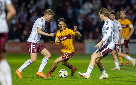 Hearts and Motherwell players in action