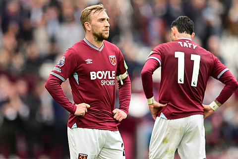Jarrod Bowen and Taty Castellanos look dejected after defeat to Arsenal 