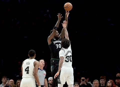 San Antonio Spurs and Minnesota Timberwolves players in action