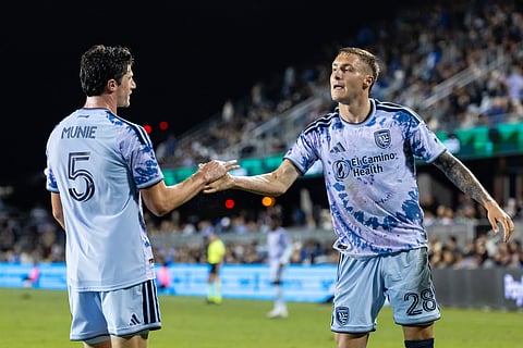 Daniel Munie and Benjamin Kikanvoic of San Jose Earthquakes