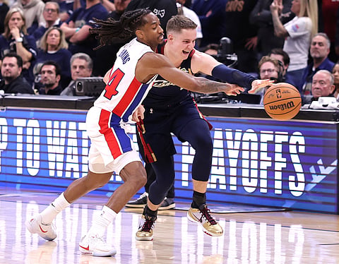 Cleveland Cavaliers and Detroit Pistons players in action