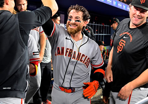 Eric Haase celebrates after hitting a home run against Dodgers