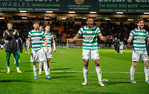 Celtic players celebrate their win over Motherwell 