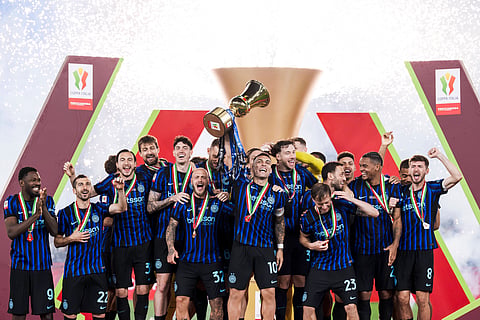 Inter Milan captain Lautaro Martinez lifts the trophy