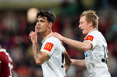 Logan Rogerson celebrates his goal for Auckland FC
