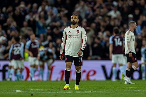 Mohamed Salah reacts after Aston Villa scored their fourth goal 