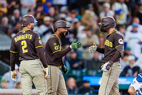 San Diego Padres players celebrate during an MLB game