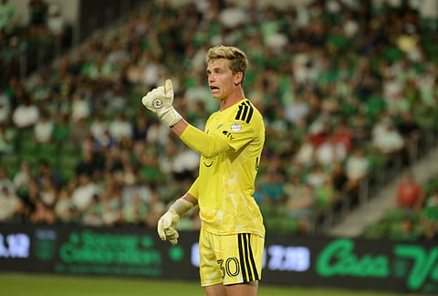Sporting Kansas City goalkeeper Stefan Cleveland sets up for a corner kick