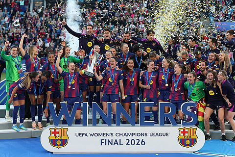 Barcelona players lift the UEFA Women's Champions League trophy