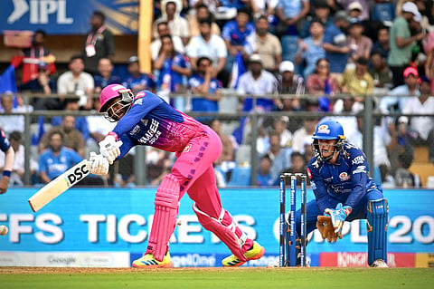 Jofra Archer plays a shot against Mumbai Indians