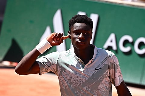 Moise Kouame celebrates his win in the French Open first round 
