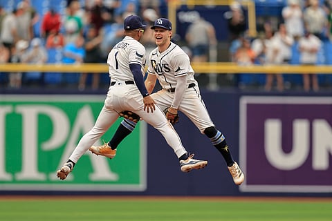 Tampa Bay Rays' Taylor Walls and Richie Palacios celebrate win