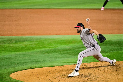 Arizona Diamondbacks pitcher Ryan Thompson sends a pitch