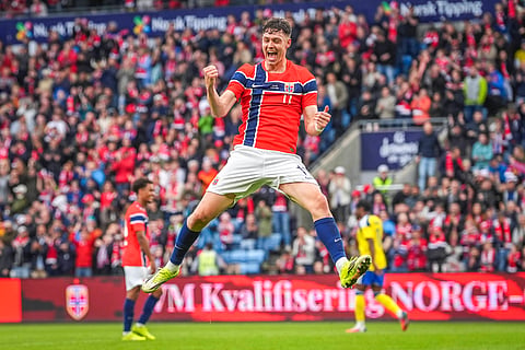 Jorgen Strand Larsen celebrates his goal against Sweden
