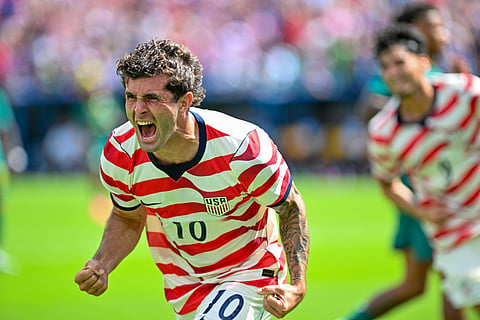 Christian Pulisic celebrates his goal against Senegal
