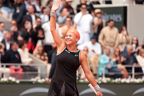 Diana Shnaider celebrates her win against Aryna Sabalenka
