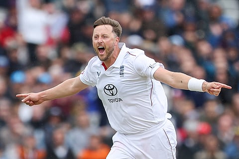 Ollie Robinson celebrates taking a wicket against New Zealand