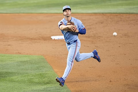 Texas Rangers baseman Justin Foscue in action against Cleveland Guardians