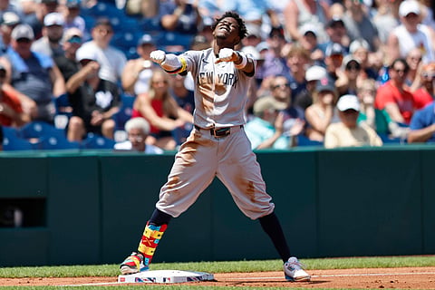 Jazz Chisholm Jr. celebrates after hitting a 2 RBI triple against Cleveland Guardians