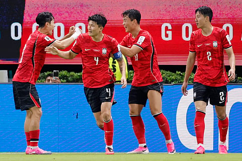 South Korea players celebrate their winning goal against Czechia