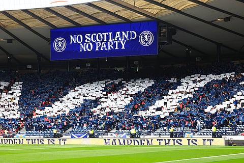 Scotland fans with a mosaic display during their game against Curacao