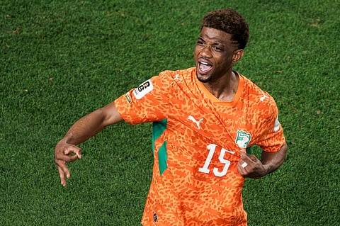 Amad Diallo celebrates after scoring the late winner against Ecuador