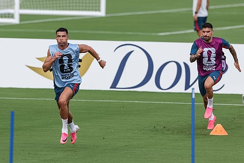 Cristiano Ronaldo and Ruben Neves pictured during training session