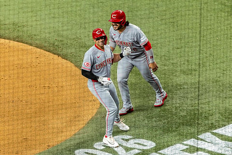 Eugenio Suarez celebrates with Spencer Steer