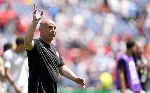 Hossam Hassan waves to the fans at the end of Belgium vs Egypt match
