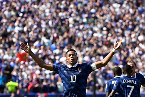 Kylian Mbappe celebrates his goal against Senegal 