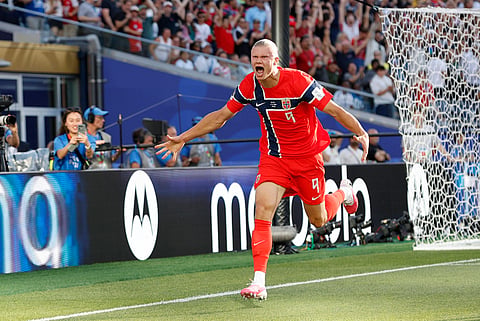 Erling Haaland celebrates his goal against Iraq