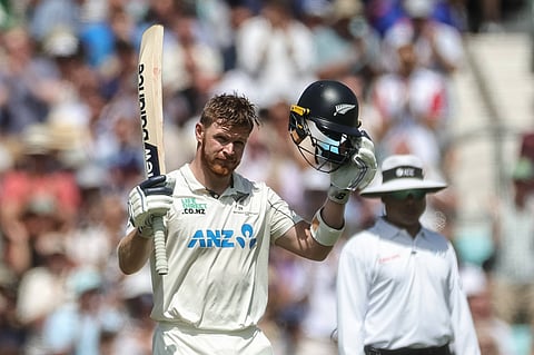 Glenn Phillips celebrates his century against England