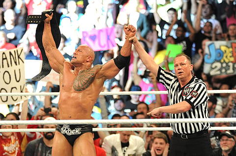 WWE Referee Mike Chioda with The Rock 