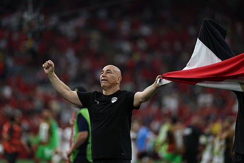 Hossam Hassan celebrates with the Egypt flag after win over New Zealand