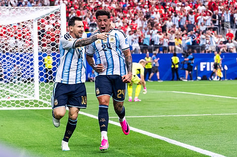 Lionel Messi celebrates his record-breaking goal at the World Cup